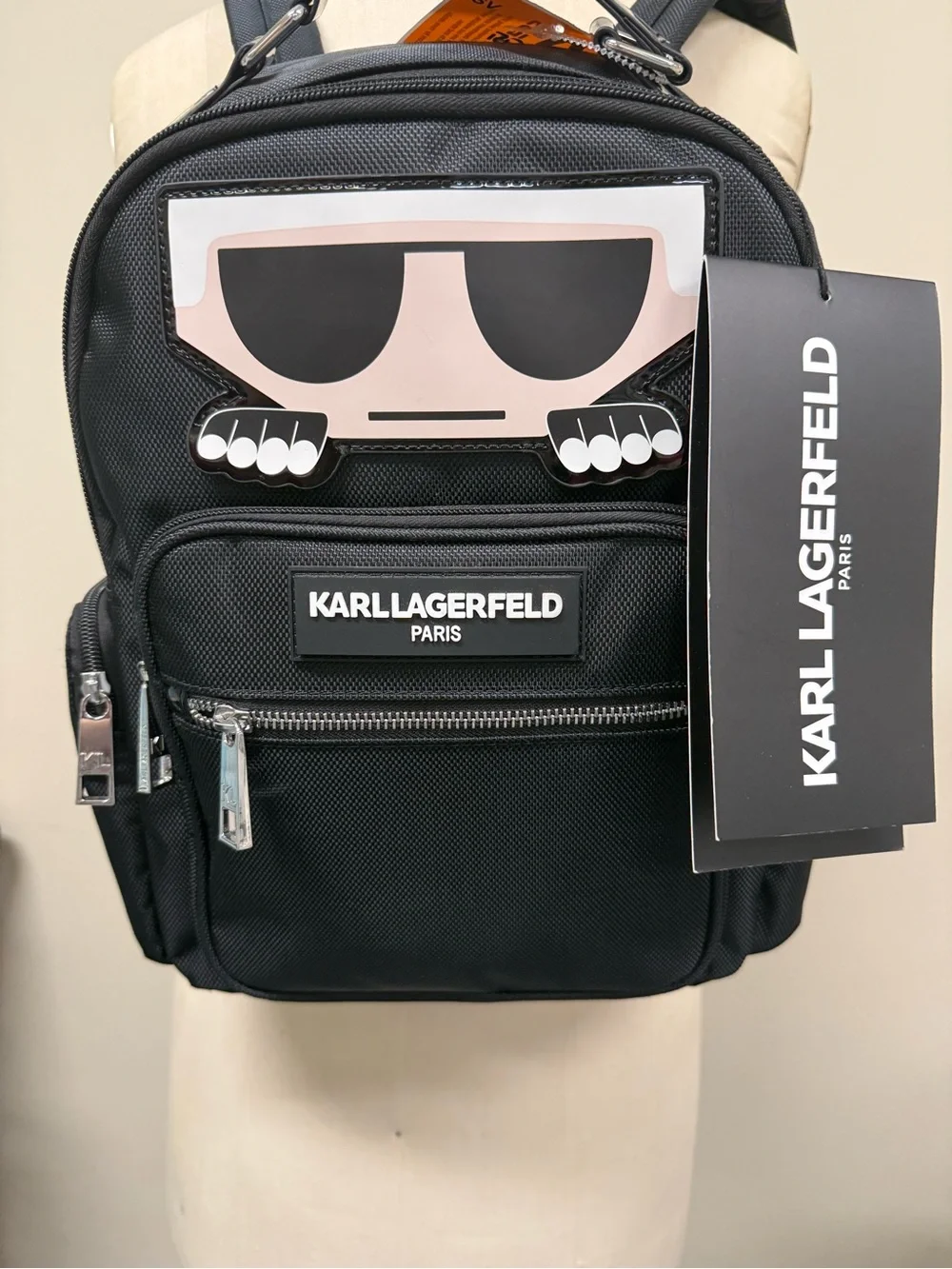Karl Lagerfeld Travel Black Mini Backpack with Graphic “peekaboo” Lets go,  NWT